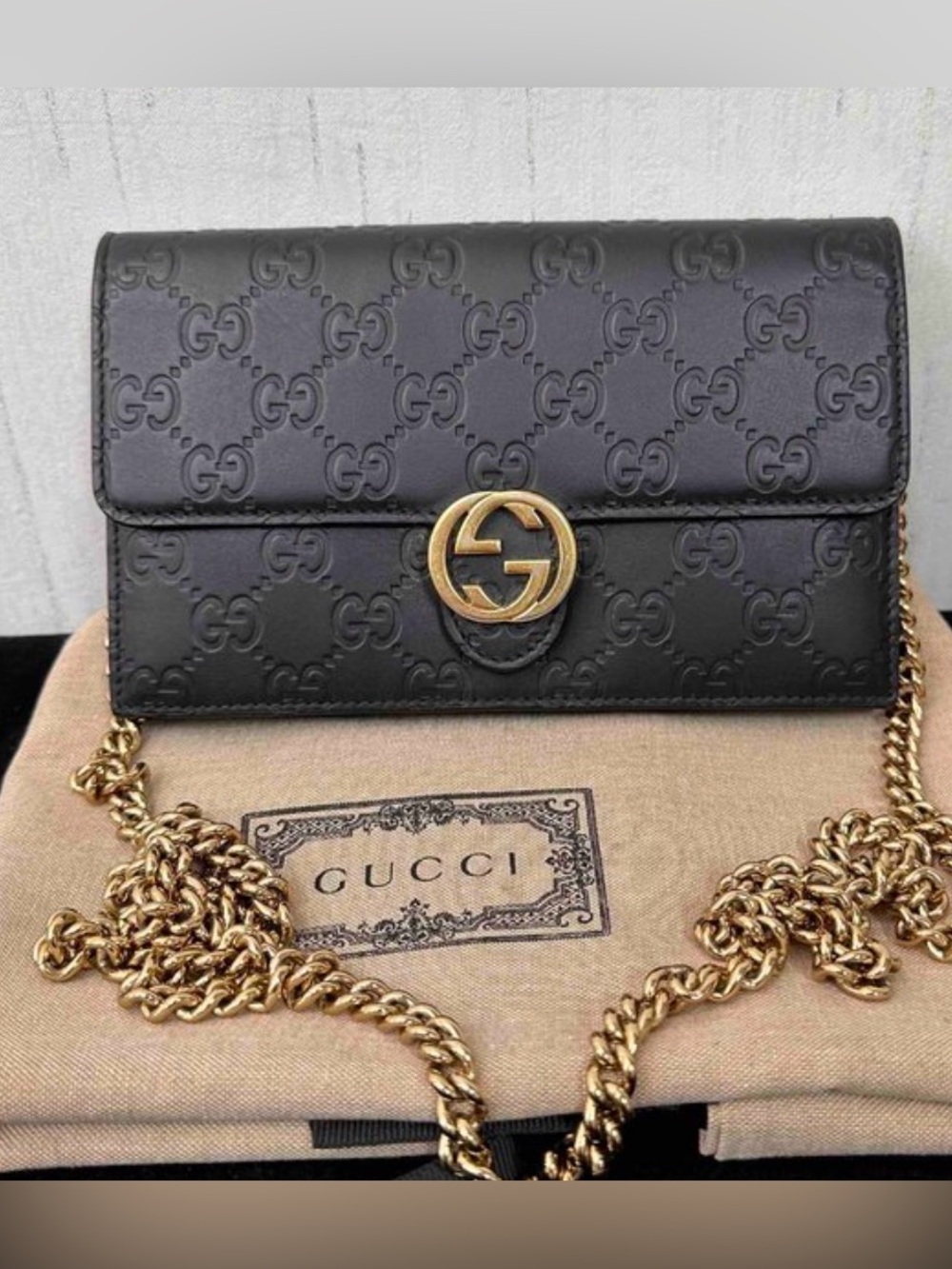 Authentic Gucci Black GG Embossed Leather Crossbody with Gold Chain